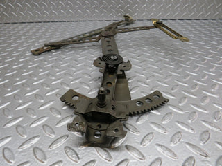 W123 front left manual window regulator used OEM