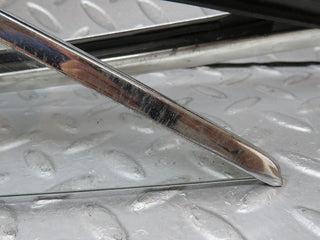 W108 front left quarter window used OEM