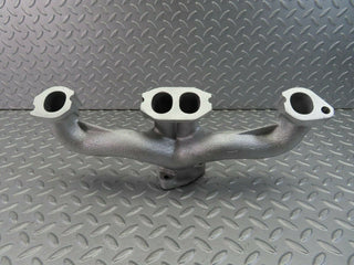 W115 exhaust manifold used OEM