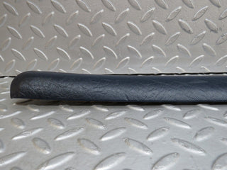 W109 rear left door card top trim blue used OEM