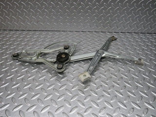 W124 Wagon front left power window regulator used OEM