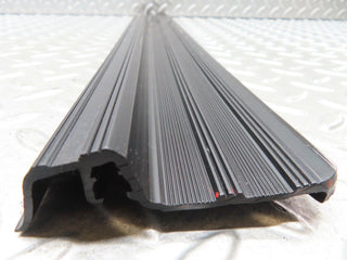 W123 front left door sill trim black used OEM