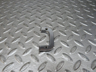 W123 left interior door chrome latch trim used OEM