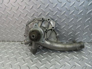 W124 water pump used OEM