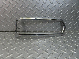 W108 tail light chrome frame left used OEM