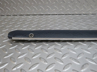 W109 rear left door card top trim blue used OEM