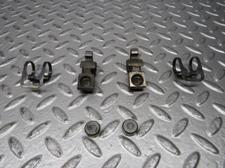 W123 valve rocker arm with tappet and retaining spring used OEM