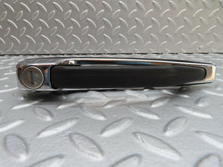 W123 front left exterior door handle used OEM