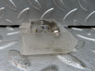 C140 Coupe glove box light used OEM