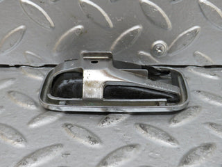 W123 Wagon door opener chrome frame right used OEM