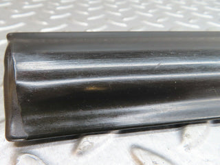 W123 front left door lower moulding trim used OEM