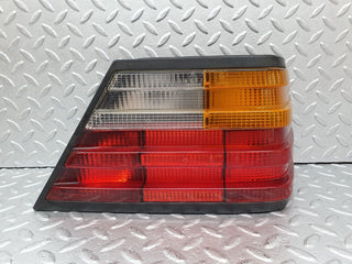 W124 tail light right side used OEM