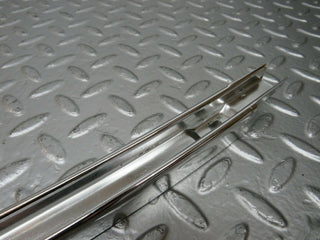 W108 front right chrome window channel used OEM