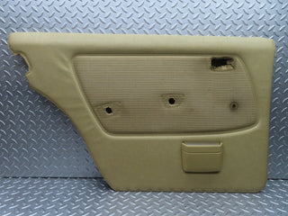 W123 rear left door card beige used OEM