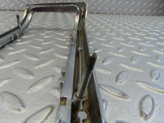 W115 tail light chrome frame left used OEM