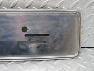 W123 front chrome number plate holder used OEM