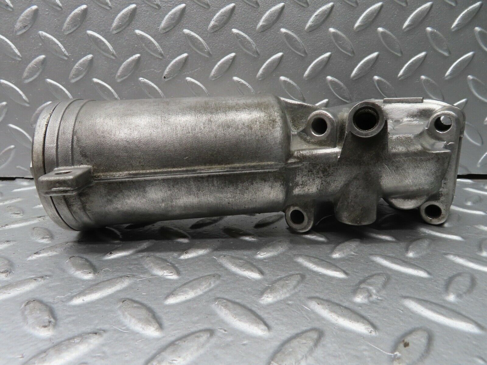 21357 Mercedes-Benz W123 230E Oil Filter Housing 1021800711