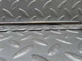 W123 rear right chrome window channel used OEM