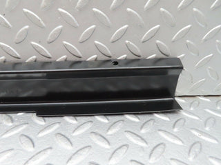 W123 cable channel cover front left used OEM