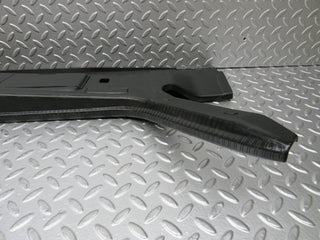 W124 trunk lock trim panel used OEM