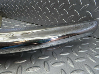 W111 front left upper bumper corner used OEM