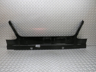 W124 trunk lock trim panel used OEM