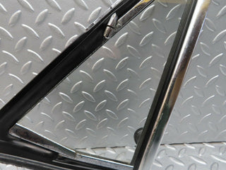 W108 front left quarter window glass used OEM