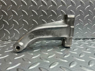 W116 engine mount bracket left side used OEM