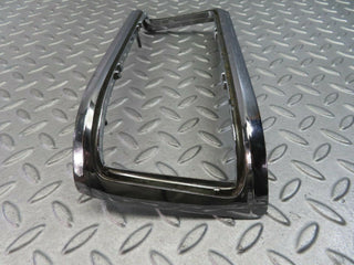 W115 tail light chrome frame left used OEM