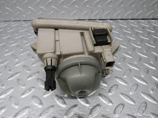 R129 SL front left fog light used OEM