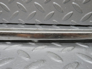 W108 rear right door chrome window channel used OEM