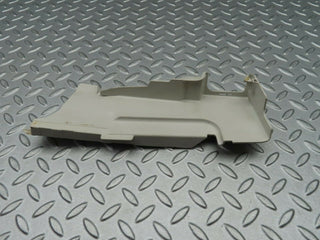 W124 lock cover front left used OEM