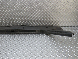 W124 Coupe trunk lock trim panel used OEM