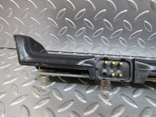 W123 tail light bulb holder right side used OEM