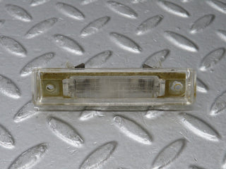 R129 SL number plate light used OEM