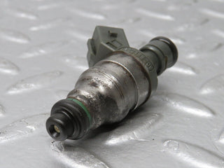 W124 Cabriolet fuel injector used OEM