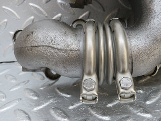W140 exhaust manifold left used OEM