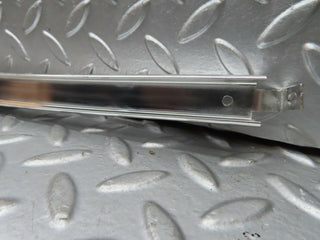 W123 rear left door chrome window channel used OEM
