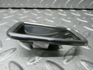 W123 Wagon chrome frame for door opener right used OEM