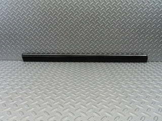 W123 front left door lower trim used OEM