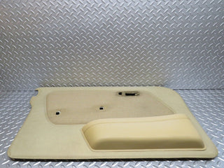 W123 front left door card beige used OEM