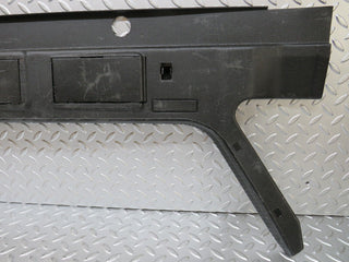 W124 trunk lock trim panel used OEM