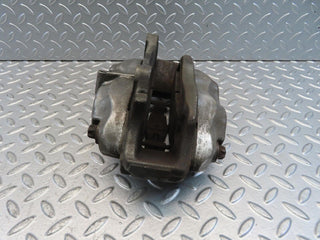 W221 front left brake caliper used OEM