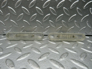 W124 Coupe number plate light pair used OEM