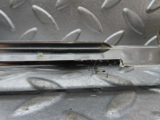 W116 rear left door chrome window channel used OEM