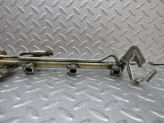 W124 Cabriolet fuel injector rail used OEM