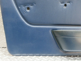 W123 front left door card blue used OEM