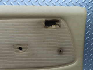W123 rear left door card beige used OEM