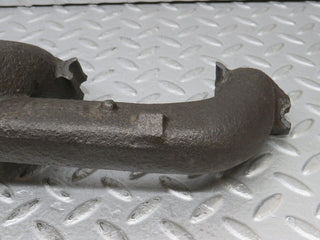 W123 exhaust manifold used OEM