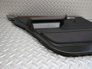 W202 rear left door card used OEM